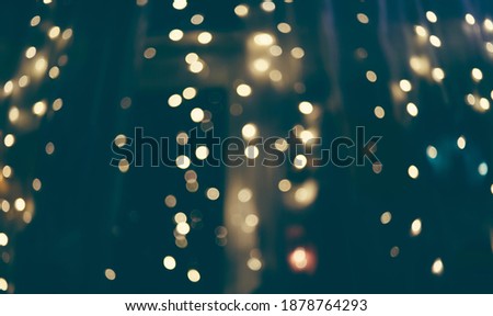 Yellow Glitter Vintage lights background, defocused. Beautiful holiday Concept. Abstract Bokeh blurred  Lights, Copy Space.