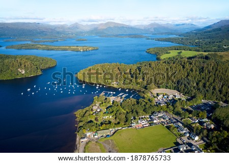 Aerial view of Balmaha Scottish village at Loch Lomond Royalty-Free Stock Photo #1878765733