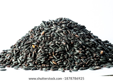 Black venus rice pile isolated on white background in Brazil