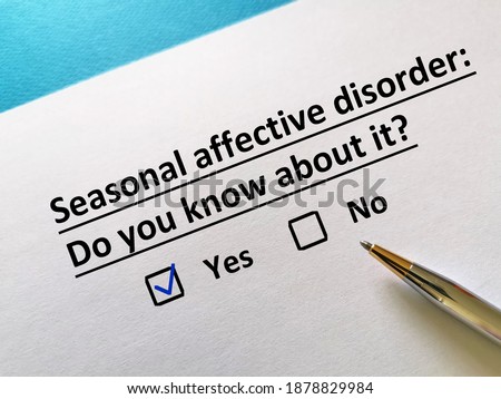 One person is answering question. He knows about seasonal affective disorder. Royalty-Free Stock Photo #1878829984