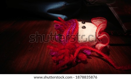 this is a picture of a doll in the dark