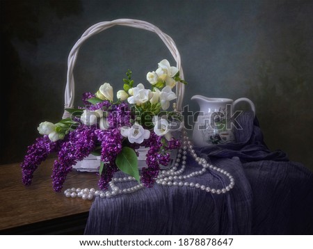 Still life with bouquet of spring flowers in the basket
