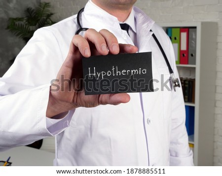 Health care concept meaning Hypothermia  with sign on the page.
 Royalty-Free Stock Photo #1878885511