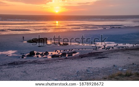 Coast in northern France in sunset with afterglow