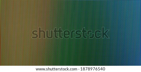 Abstract macro photo-texture of yellow-green pixels of the TV