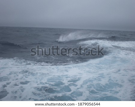Antarctica ocean fog and waves and wind