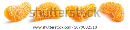 Set of four peeled tangerine slices without membrane on white background with clipping path Royalty-Free Stock Photo #1879082518