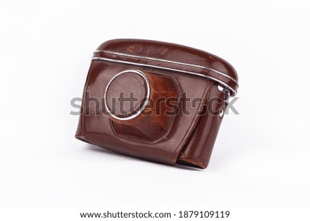 leather case of retro camera on isolated white