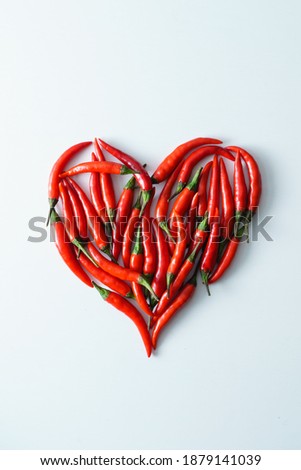 heart from chili peppers, top view
