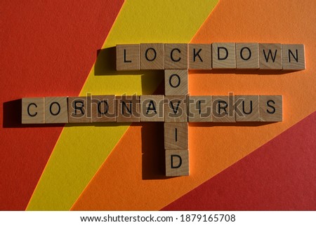 Lockdown, Covid, Coronavirus, words in wooden alphabet letters in crossword form isolated on colourful background
