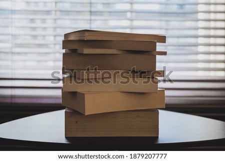 Pile of books on a table