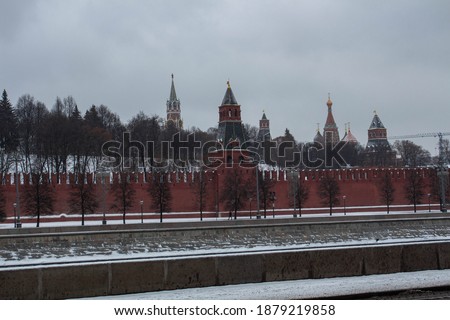 The Red Square. Red brick wall wall. Moscow. Church domes. Kremlin. The Spasskaya Tower.