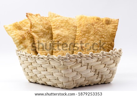 Brazilian pastry, traditional pasta called meat pastry on isolated on white background, copyspace Royalty-Free Stock Photo #1879253353