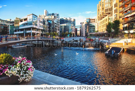 The Oslo Norway Harbor is one of Oslo's great attractions. Situated on the Oslo Fjord in Oslo, Norway.Views of sea and city Royalty-Free Stock Photo #1879262575