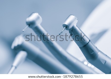 Different dental instruments and tools in a dentists office Royalty-Free Stock Photo #1879278655