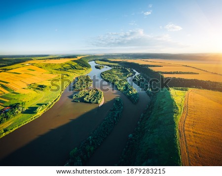Attractive bird's eye view of the Dniester river with small islands. Location place Dnister canyon of Ukraine, Europe. Aerial photography, drone shot. Photo wallpaper. Discover the beauty of earth.