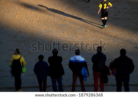 People walking on the shore