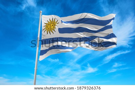Large Uruguay flag waving in the wind