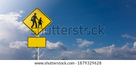Warning sign for school beware of children means that there is a school in the road ahead. Be careful when driving