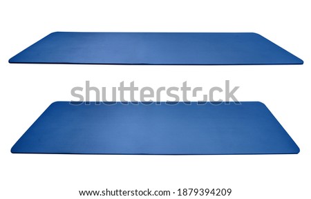 Blue rolled out yoga mat isolated on white background with clipping path Royalty-Free Stock Photo #1879394209