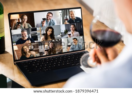 Virtual Wine Tasting Dinner Event Online Using Laptop Royalty-Free Stock Photo #1879396471