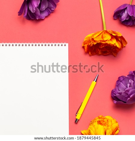 Flat lay Spring flowers. Yellow lilac peony tulips white blank album notebook writing pen on pink background. Lovely greeting card for March 8, Mothers day, holiday, birthday wedding or happy event