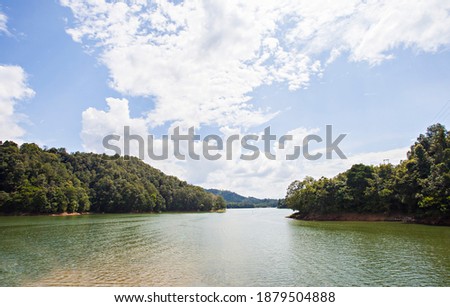 Beautiful view of Riam Kanan lake from the peak of Matang Kaladan hill in Banjar, South Kalimantan. Riam Kanan is a dam for power plant and conservation. Royalty-Free Stock Photo #1879504888