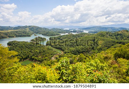 Beautiful view of Riam Kanan lake from the peak of Matang Kaladan hill in Banjar, South Kalimantan. Riam Kanan is a dam for power plant and conservation. Royalty-Free Stock Photo #1879504891