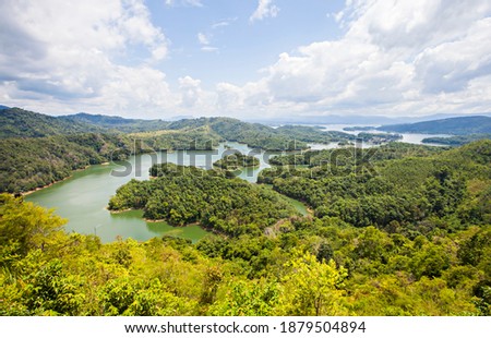 Beautiful view of Riam Kanan lake from the peak of Matang Kaladan hill in Banjar, South Kalimantan. Riam Kanan is a dam for power plant and conservation. Royalty-Free Stock Photo #1879504894
