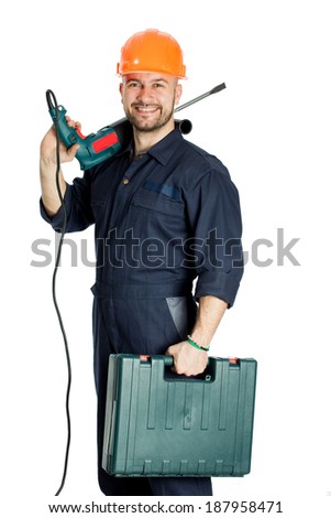 young worker standing with drill isolated on white background
