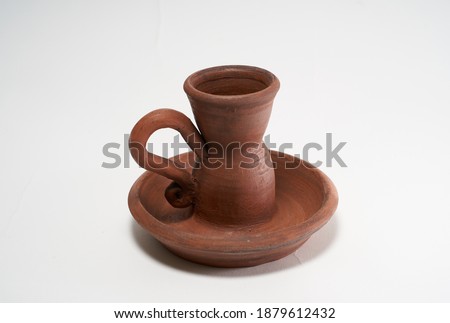 Pottery Craft, ceramic product with your own hands, made on a Potter's wheel, isolated on a white background, clay.