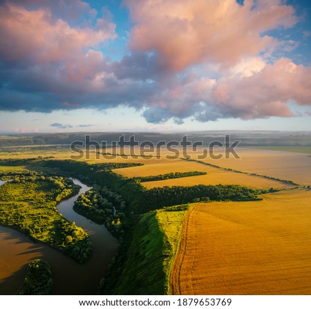 Picturesque bird's eye view of the Dniester river with small islands. Location place Dnister canyon of Ukraine, Europe. Aerial photography, drone shot. Photo wallpaper. Discover the beauty of earth.