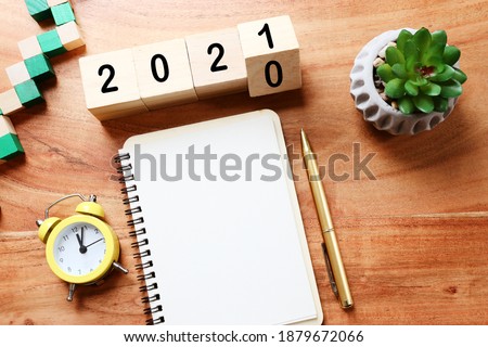 New year 2021 concept. business idea over wooden board
