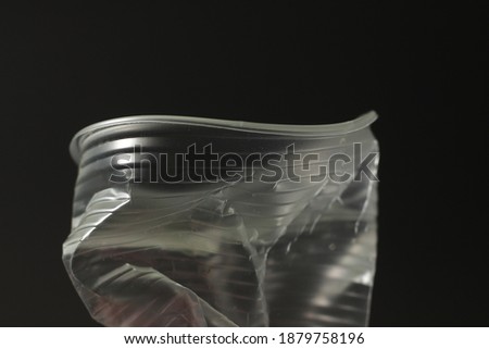 variety of compressed plastic bottles isolated on black background