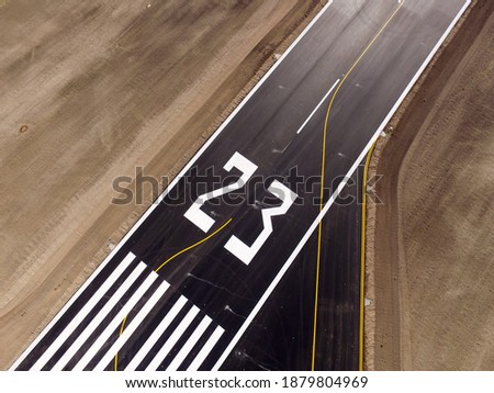 aerial view of a take-off runway Royalty-Free Stock Photo #1879804969