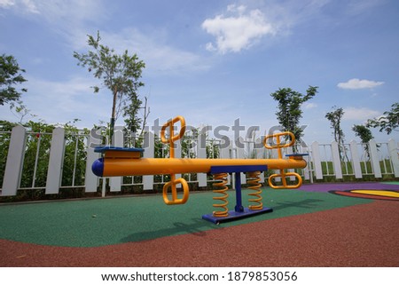 The play area for children is filled with colors and cute pictures