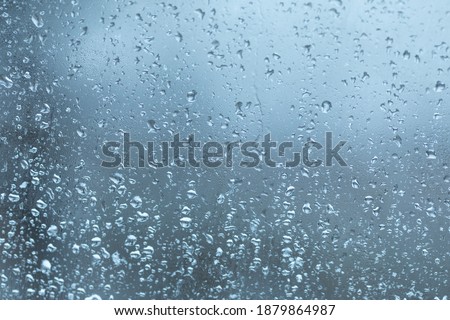 Dripping Condensation, Water Drops Background Rain drop Condensation Texture. Close up for misted glass with droplets of water draining down Royalty-Free Stock Photo #1879864987
