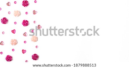 Greeting card for Valentine's Day. hearts, roses and rhinestones on white background