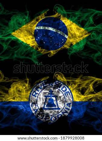 Brazil, Brazilian vs United States of America, America, US, USA, American, Riverside, California smoky mystic flags placed side by side. Thick colored silky abstract smoke flags.