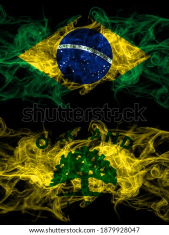Brazil, Brazilian vs United States of America, America, US, USA, American, Oakland, California smoky mystic flags placed side by side. Thick colored silky abstract smoke flags.
