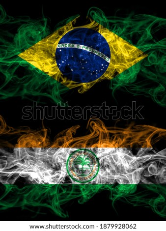 Brazil, Brazilian vs United States of America, America, US, USA, American, Miami, Florida smoky mystic flags placed side by side. Thick colored silky abstract smoke flags.