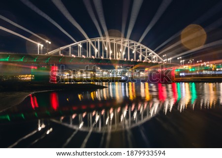 John Frost Bridge at night, camera effect while taking a picture. City Arnhem in the Netherlands