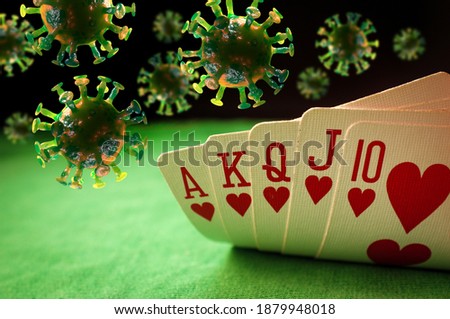 Poker winning hand royal flush with coronavirus cells as symbolic metaphor for a cure or vaccine for the virus Royalty-Free Stock Photo #1879948018