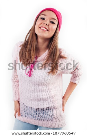 young pretty stylish hipster girl posing emotional isolated on white background happy smiling cool smile, lifestyle people concept