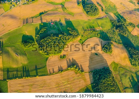 golden fields of wheat aerial view from hot air balloon