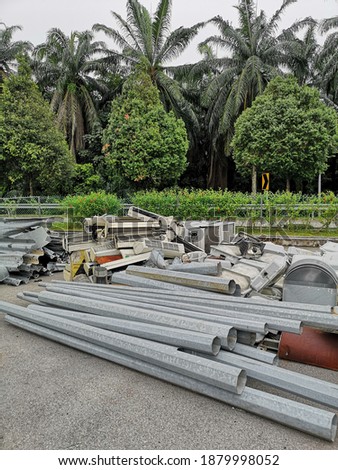 street lights that have been used and damaged and stored in a special place for disposal