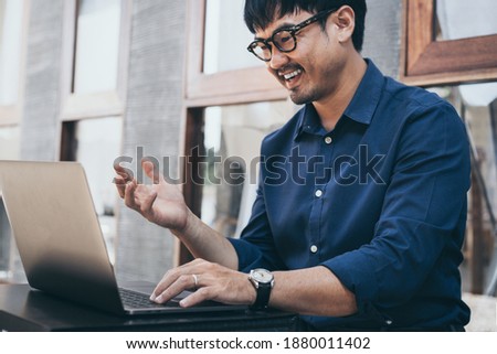 man work using computer hand typing laptop keyboard contact us online chatting search form internet sitting at office.concept for technology device communication business people