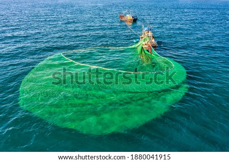 Ships and fishermen are fishing anchovies in Yen Island, Phu Yen, Vietnam