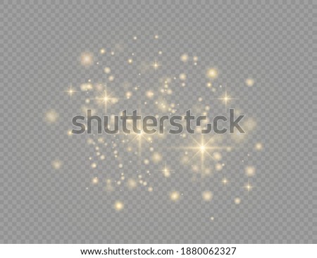 Yellow dust. Bokeh effect. Beautiful light flashes. Dust particles fly in space. horizontal light rays. Glowing streaks of dust on a dark background.