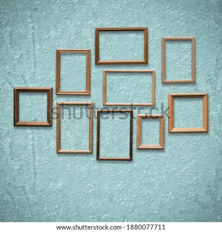old wooden frames on old blue wall